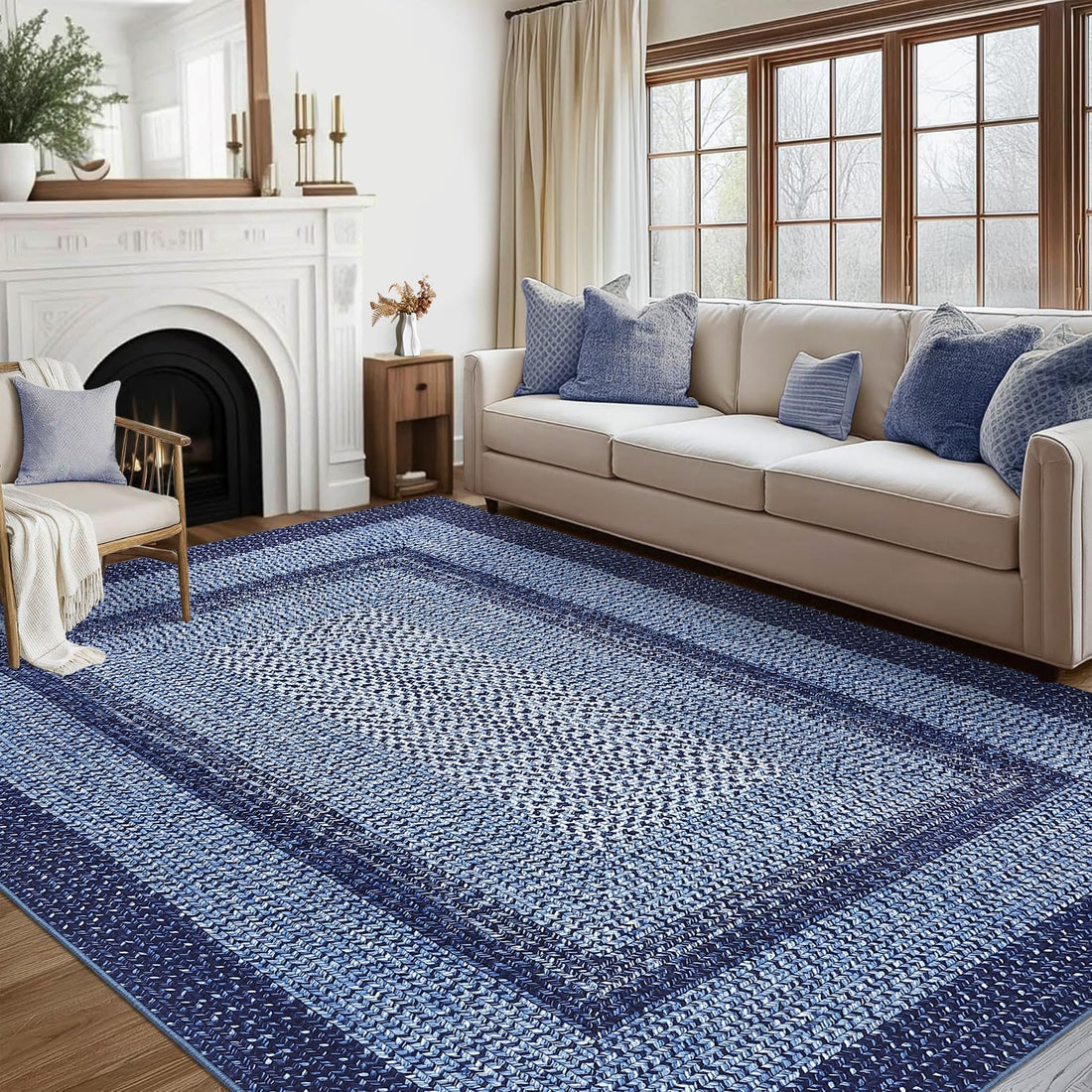 Garvee washable braided area rug 120x170cm in navy blue, shown on a living room floor